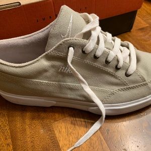 Khaki colored new, never worn women’s Nike canvas sneakers